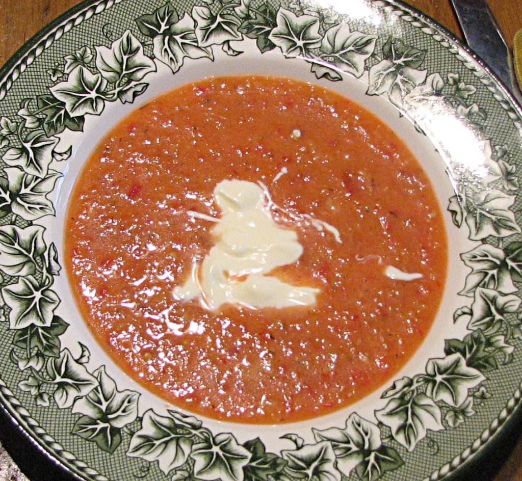 Gezpacho in bowl with sour cream