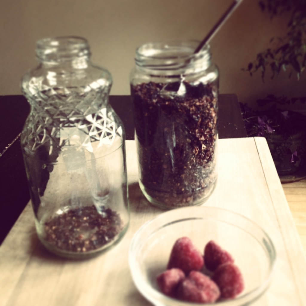 Rose Hips and frozen strawberries going 2nd ferment vessel